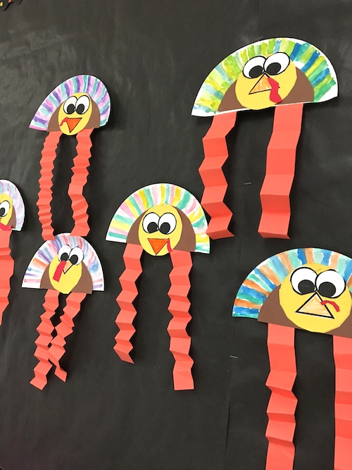 Lots of Thanksgiving Ideas for the primary classroom (K to 2). Roll a Feather math game, Patterned Turkey art, Turkey Bump, Thankful Turkey booklets and MORE! All but one is FREE. #thanksgiving #gradeonederful #firstgrade #turkeyart